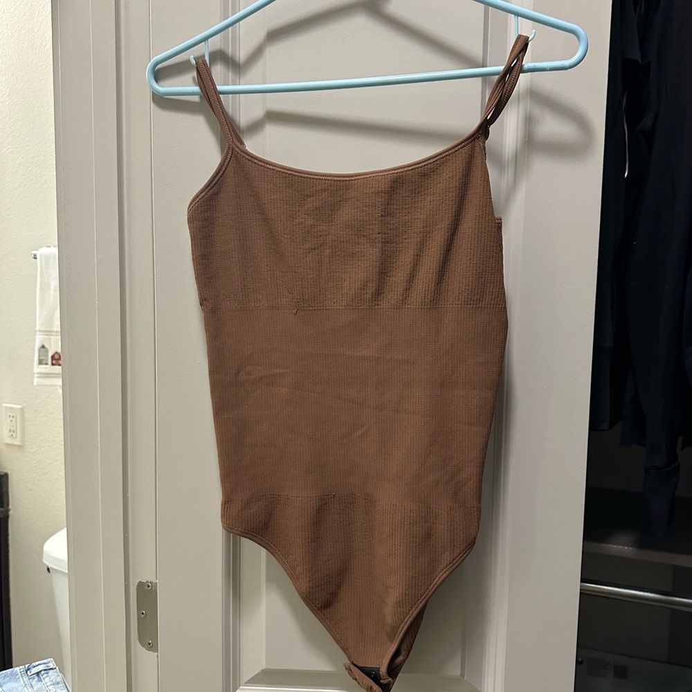 Set of ribbed bodysuits